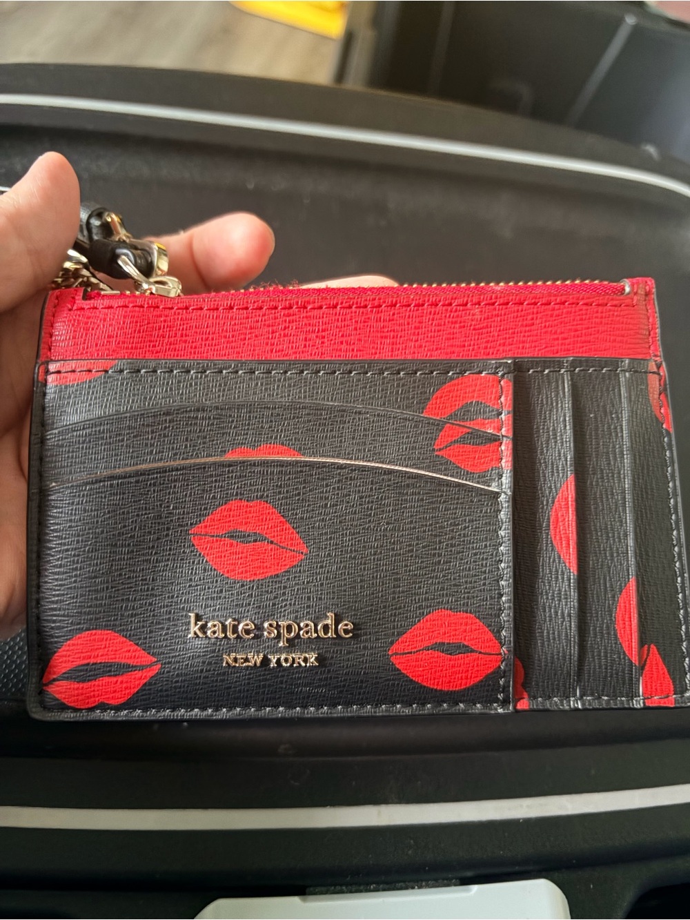 kate spade Black Wallet with Red Lip Print and Gold Logo